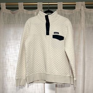 Medium Patagonia women’s pullover in beige.